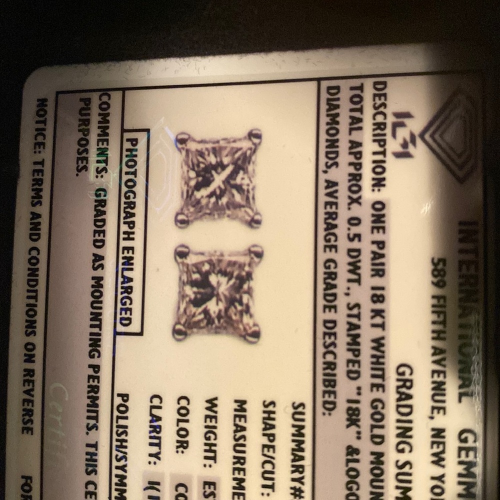 Diamond studs set in white gold, princess cut, .49ct each, .98ct total weight